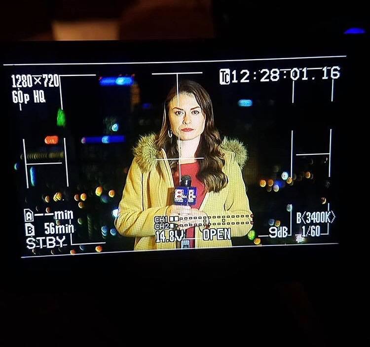 Lauren waiting on a live shot to start.
