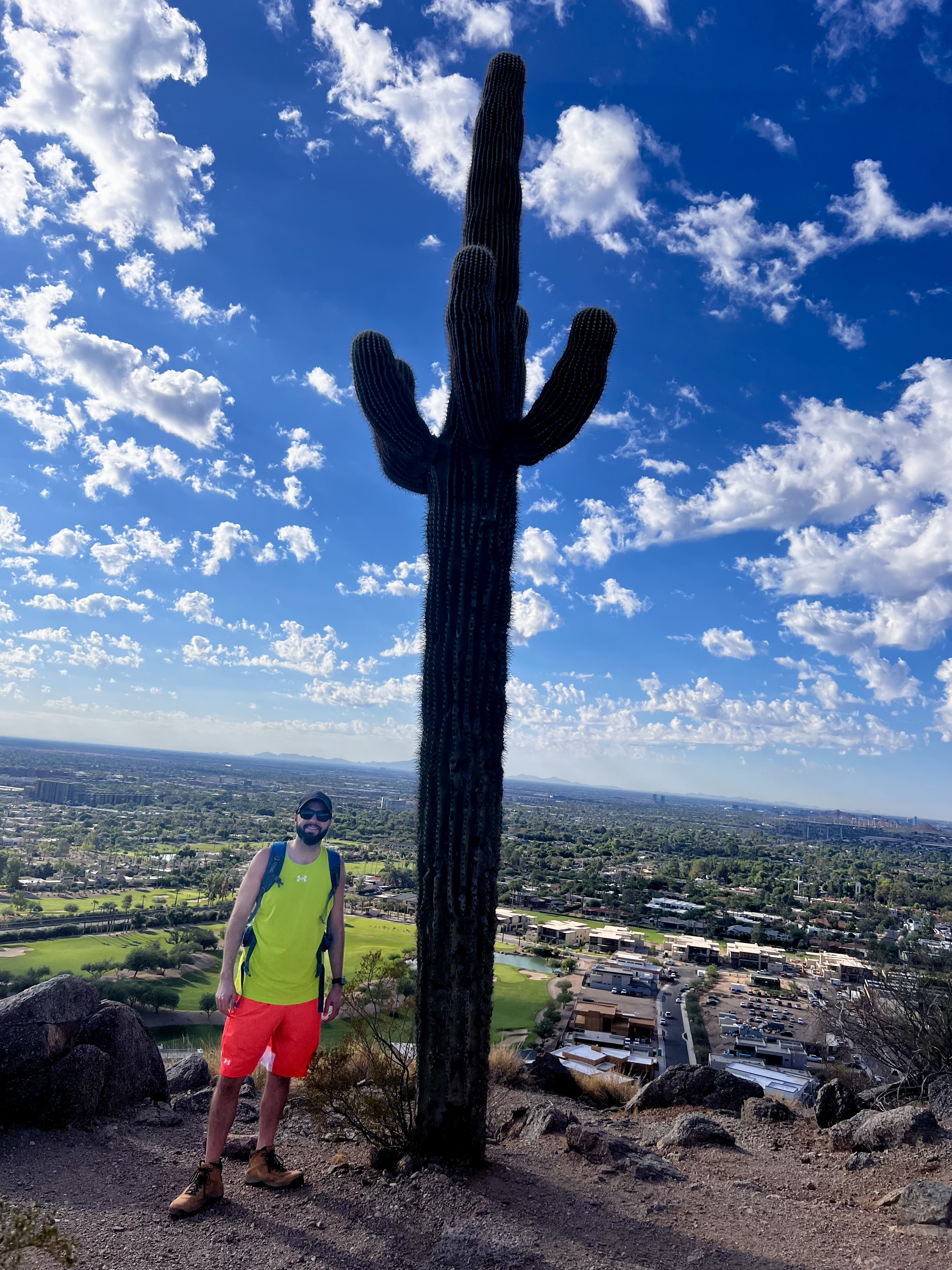 Michael with saguaro during hike up Camelback Mountain in Phoenix, Arizona.