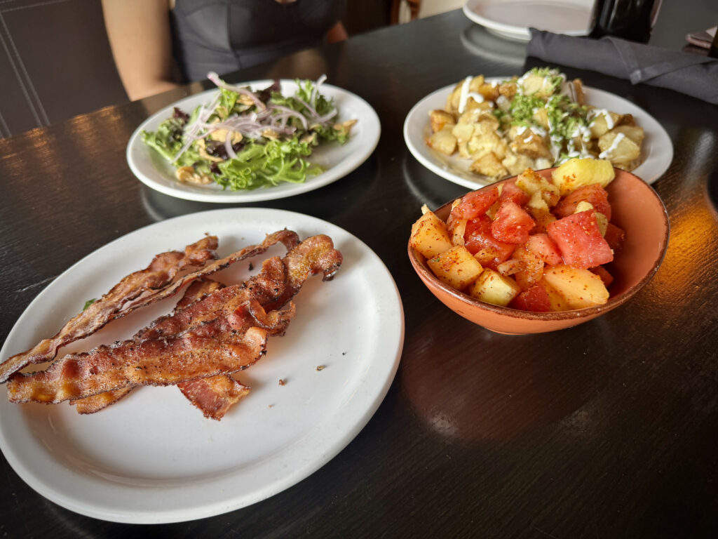 Bacon, salad, and fruit at Tamayo bottomless breakfast